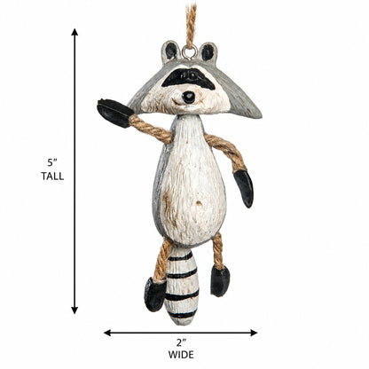 A hanging raccoon ornament shown on a white background with dimension arrows and labels indicating 5 inches tall and 2 inches wide.
