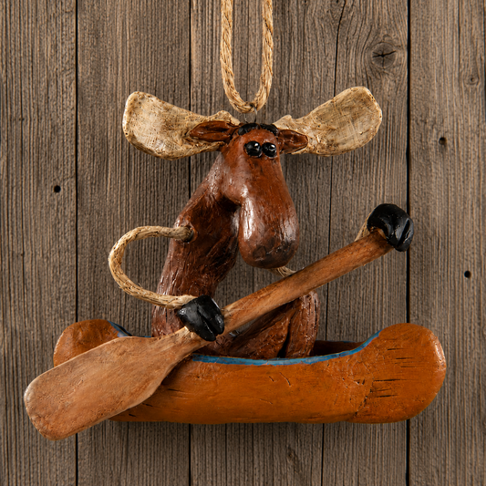 moose in a canoe ornament bert anderson collection