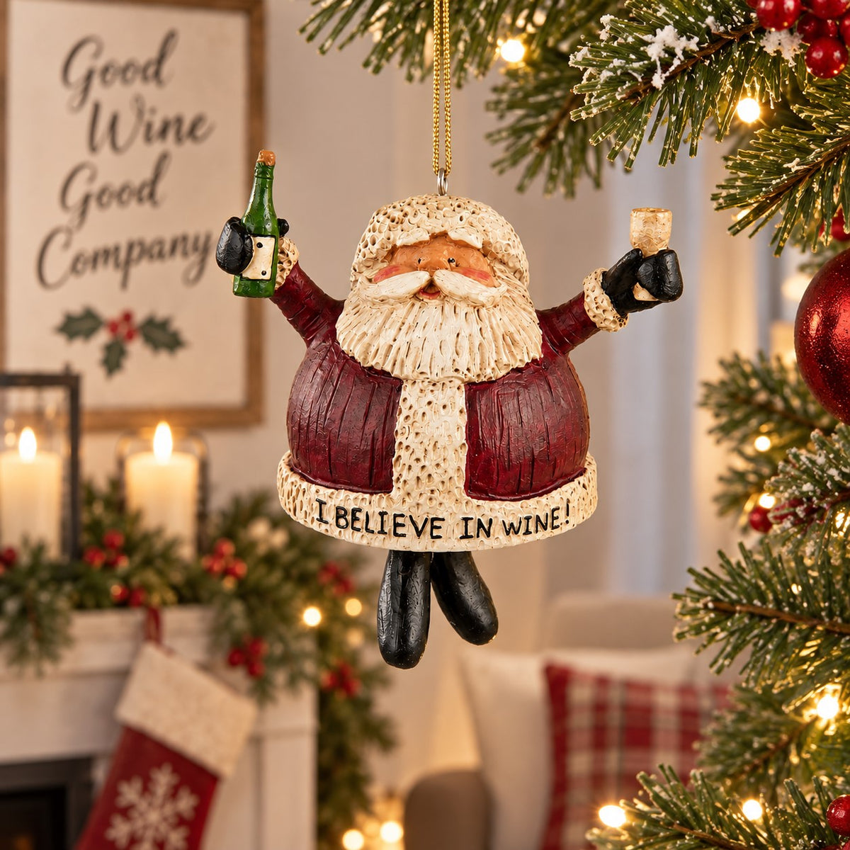 Bert Anderson “I Believe in Wine” Santa ornament with dangling boots displayed in a bright Christmas home setting with greenery and warm lights.