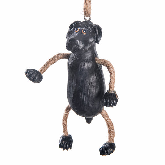 Black lab ornament hangingwith a white background