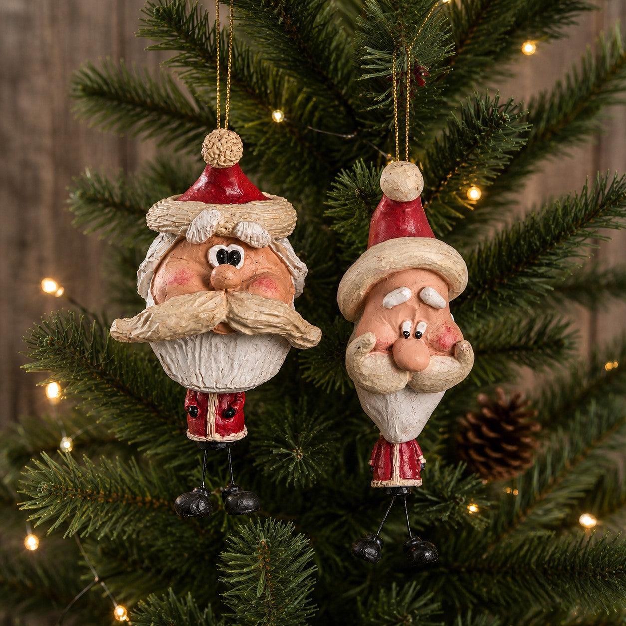 Two coordinating Santa Ornaments by Bert Anderson.