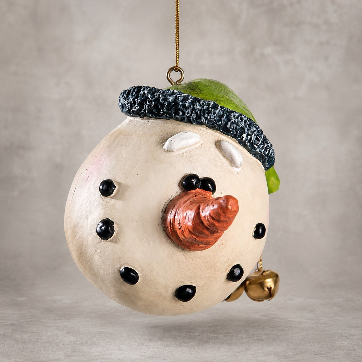Hand painted resein snowamn head ornament by Bert Anderson.  Winter and holiday decor.