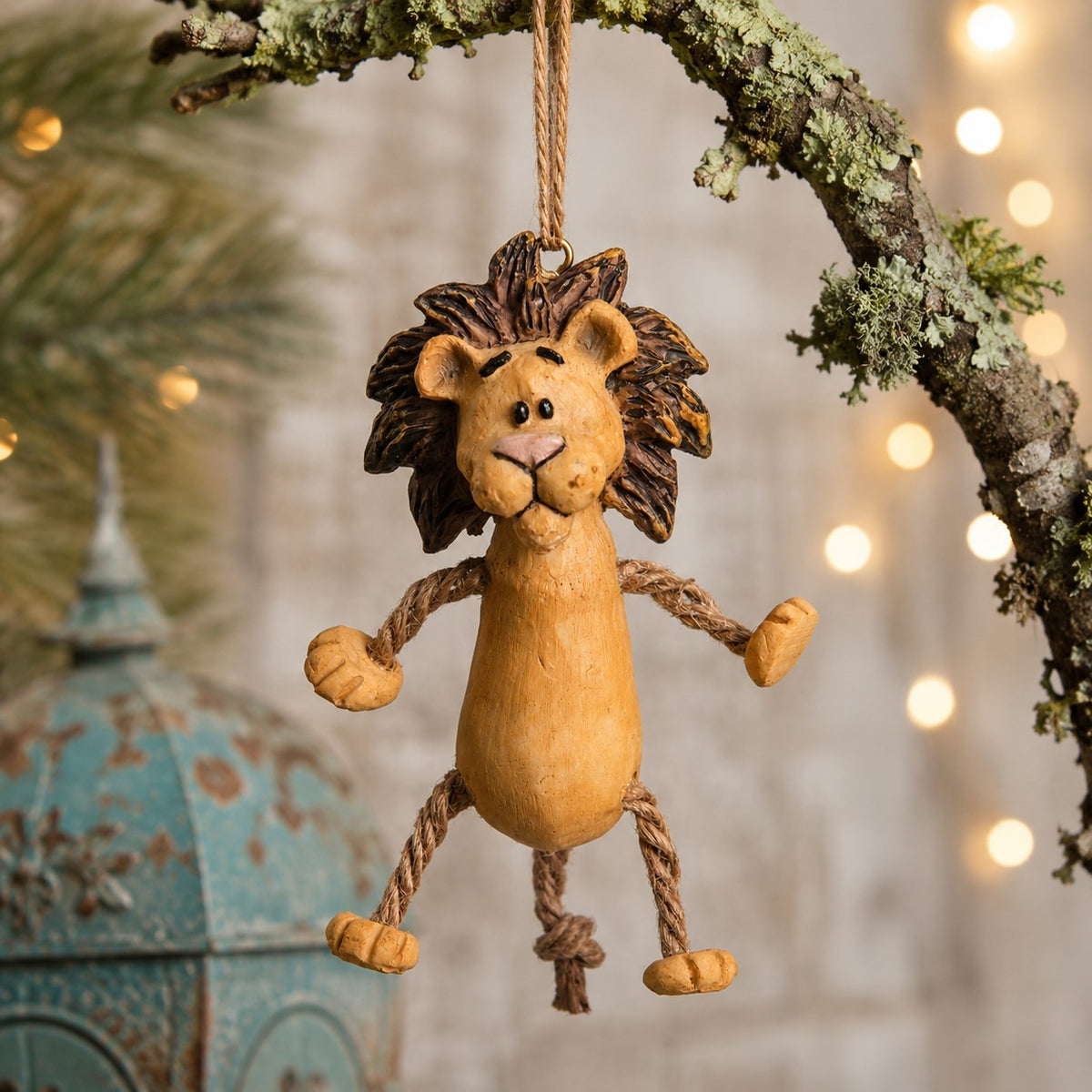 Whimsical lion ornamnet by Bert Anderson.  Hand paintned resin ornament .  African wildlife decor.