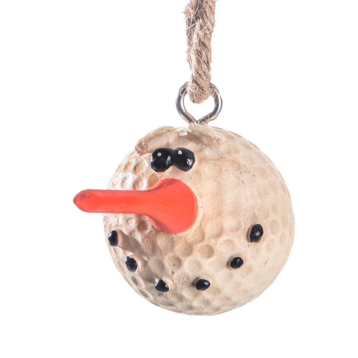 A novelty Christmas ornament shaped like a golf ball with a carved face, featuring black painted eyes and nose, a bright orange carrot nose, and a natural jute hanging loop at the top.