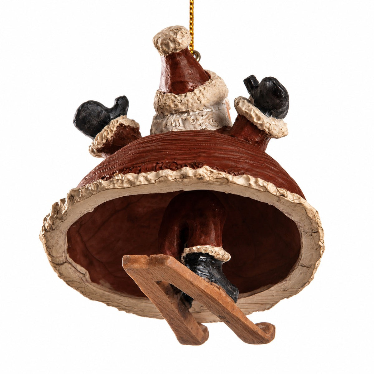 A Santa Claus Christmas ornament  with Santa's dangly legs and boots visible , a gold hanging string, and a plain white background.