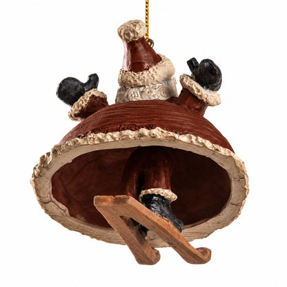 A Santa Claus Christmas ornament  with Santa's dangly legs and boots visible , a gold hanging string, and a plain white background.