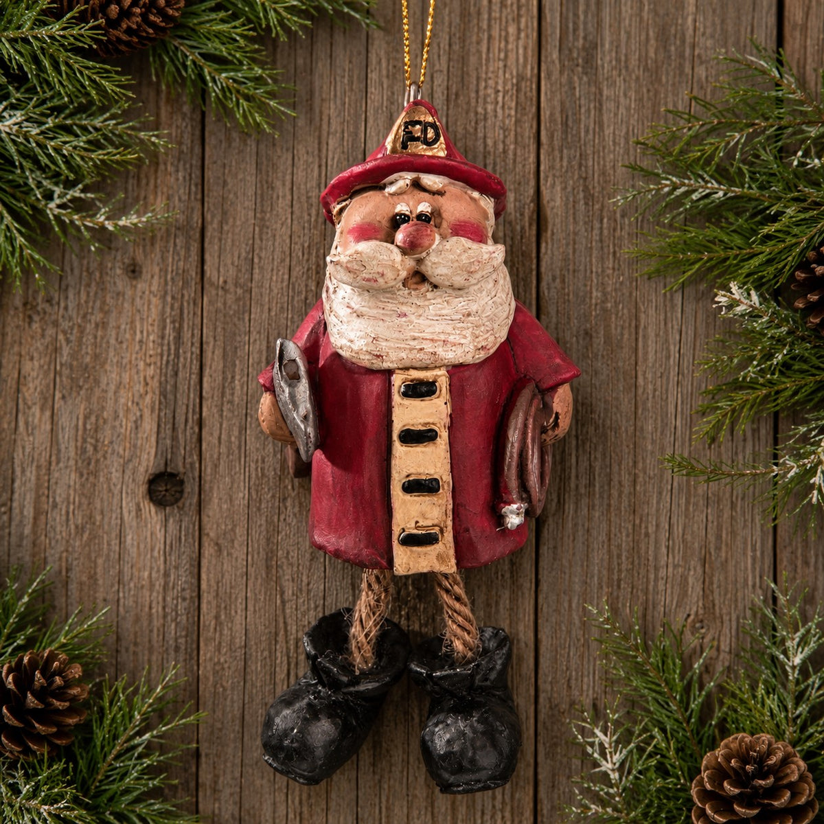 Firefighter Santa Claus Ornament with his axe , fire hose and dangly boots.  