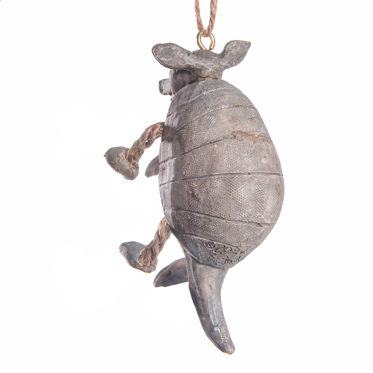 Back view of a rustic gray armadillo hanging ornament with a textured shell, rope legs, and a hanging loop at the top, shown against a plain white background.
