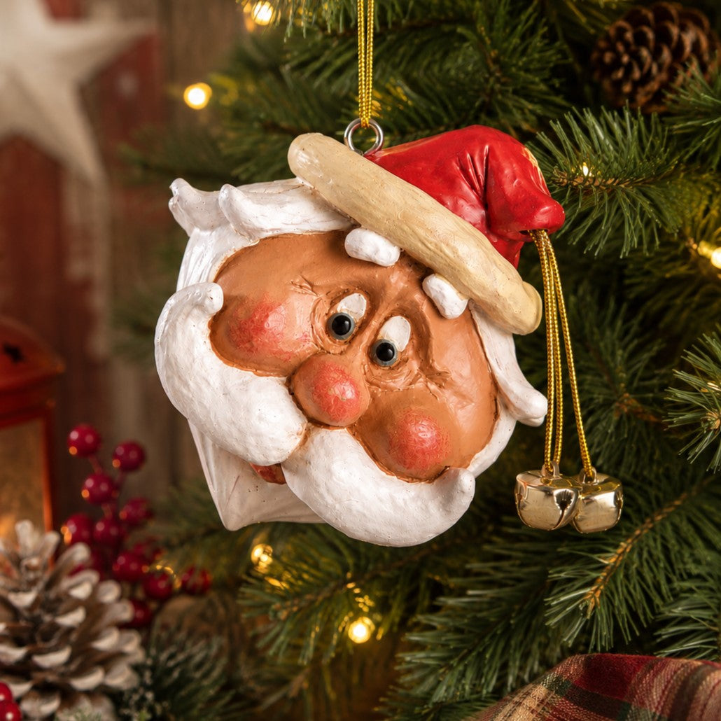 Large Santa Head Ornament on a Christmas tree.