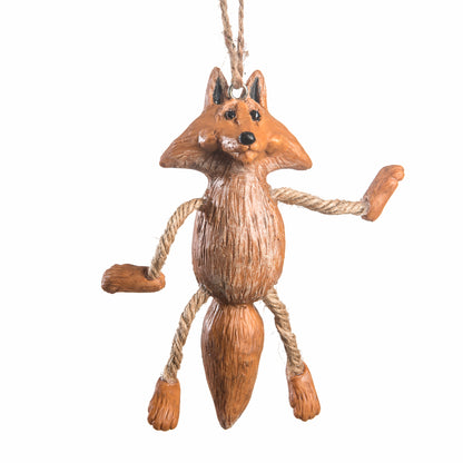 A rustic resin fox hanging ornament with rope limbs and a hanging loop, shown against a plain white background.  By  artist Bert Anderson