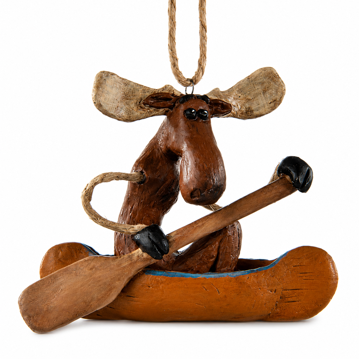 Whimsical moose in a canoe ornament on a white backgroun.  