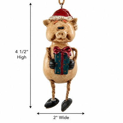 Pig Ornament  with Santa hat and Christmas present.  Measurements 4 1/2"  tall and 2 1/2" wide on a white background.