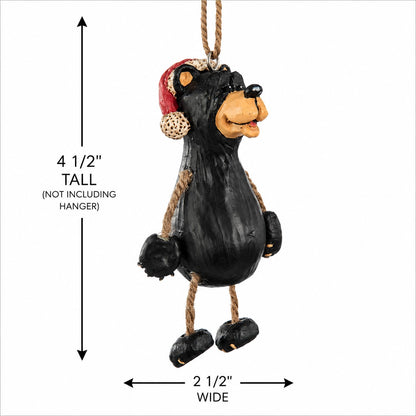 A black bear hanging ornament with a red Santa hat, shown on a white background with dimension arrows indicating 4 1/2 inches tall and 2 1/2 inches wide.