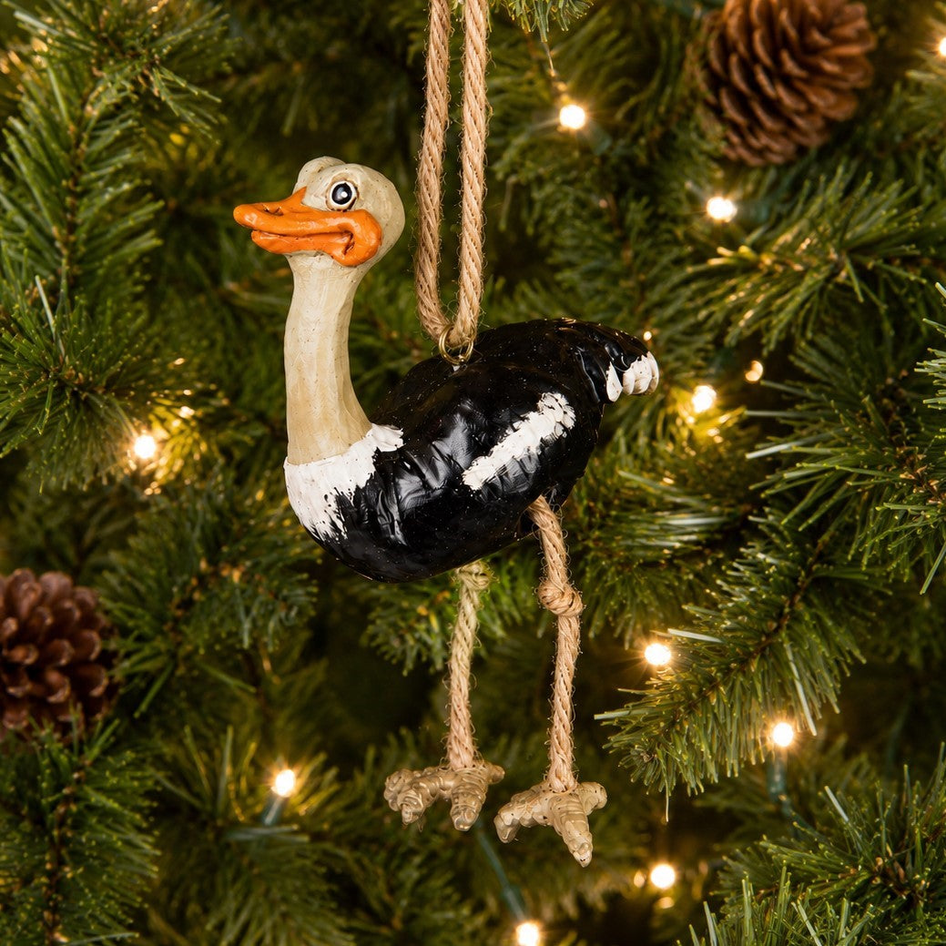 Hanging Ostrich Ornament displayed on a Christmas tree. Whimsical resin ornament by Bert Anderson.