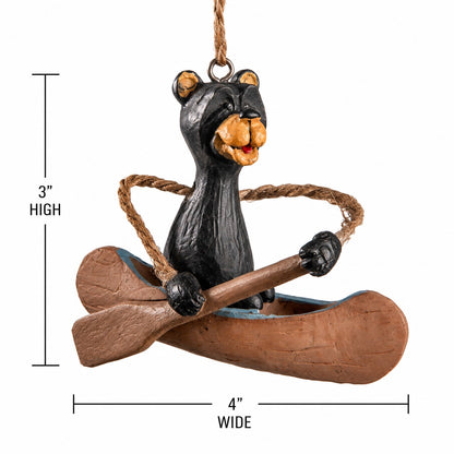 Bear in a Canoe ornament by Bert Anderson measurement 3" tall x 4" wide