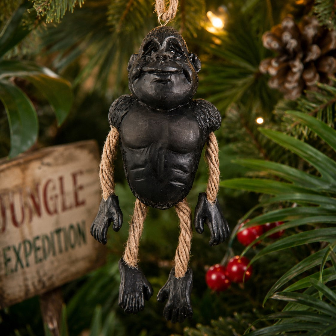 Hanging Gorilla Oranament with jungle Christmas background.