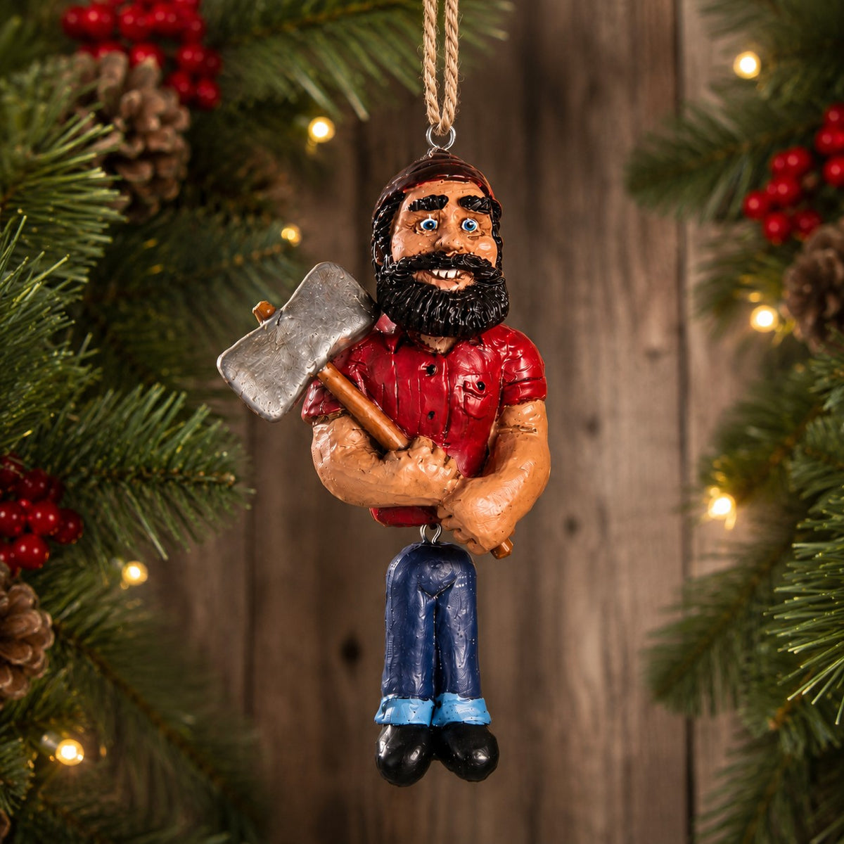 Paul Bunyan Ornament by Bert Anderson   
Featuring a traditional lumberjack style with a red shirt, blue pants, and a silver axe, hanging against a wooden background. 