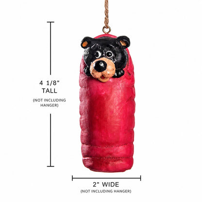 Camping black bear ornament in a sleeping bag with mmeasurments shown 4 1/8" tall x 2" wide