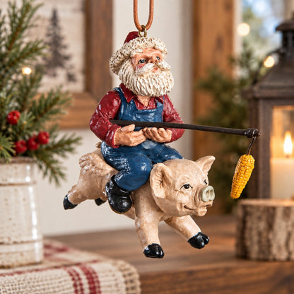 “Santa riding a flying pig ornament with dangling ear of corn hanging among Christmas tree branches and warm lights.”