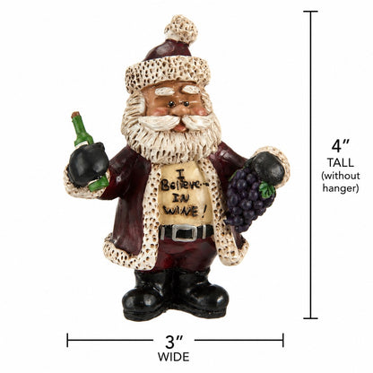 Bert Anderson “I Believe in Wine” Santa ornament with wine bottle and grapes, measuring 4 inches tall by 3 inches wide.