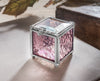 J Devlin BOX 928 pink rose textured glass keepsake box with clear beveled lid, silver finish, beaded edging, and decorative filigree.