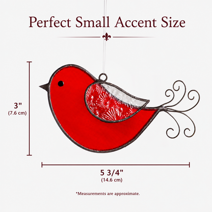 decorative red stained glass bird ornament closeup