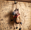 Horse ornament with cowboy vest from the Bert Anderson Collection, hand-painted resin with jute hanger.